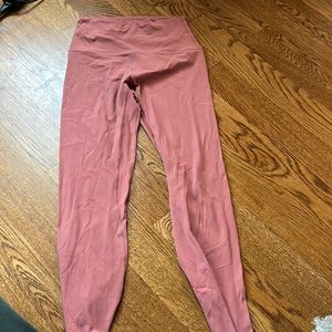 Barely worn.      25 inch. I can fit in them and i’m 28 inch usually!